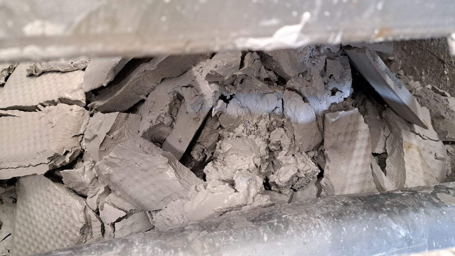 Gray filter cake after dewatering